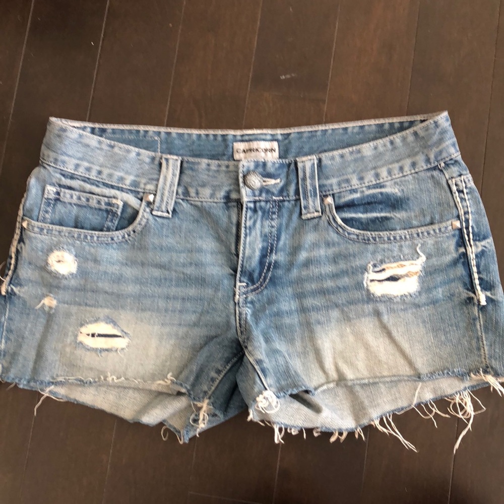Distressed denim shorts